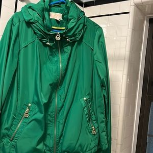 Green Michael Kors windbreaker/raincoat green size xl great condition.